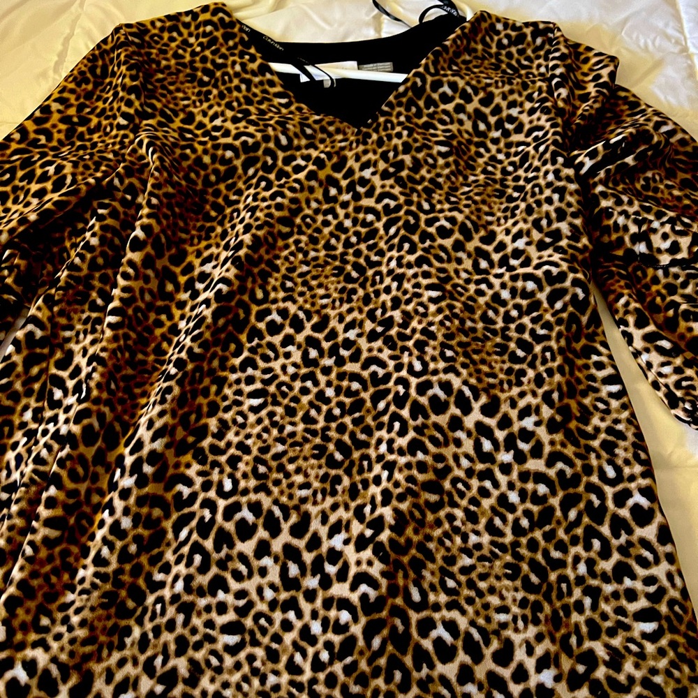 Leopard print. Great material. Worn 1x. Great for slacks